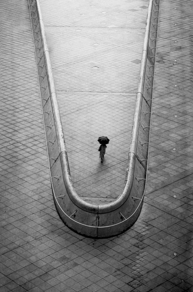 Solitary Urban Walk by Bong Goo Kang — canvas wall art