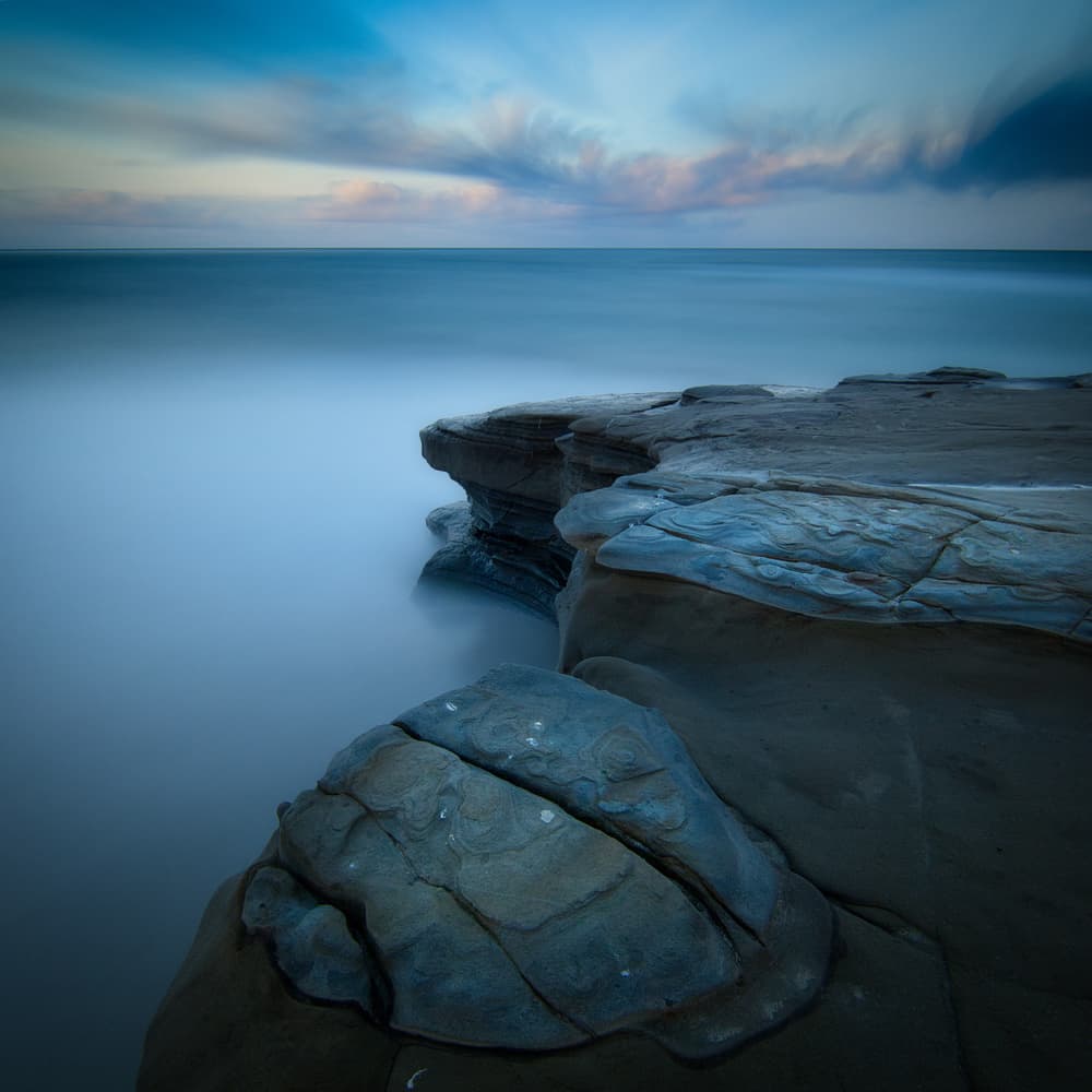 Misty Blue Coastline by Yi Fan — canvas wall art