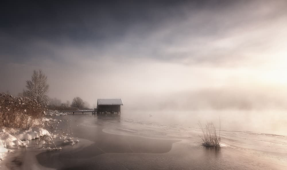 Misty Winter Boathouse by Corry DeLaan — canvas wall art