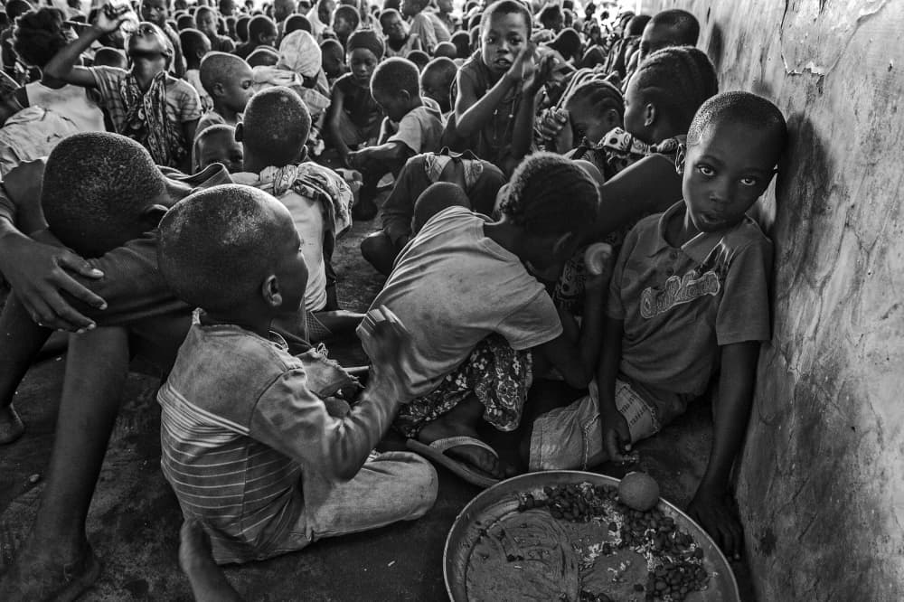 Children Sharing a Meal by Foad Mirzaie — canvas wall art