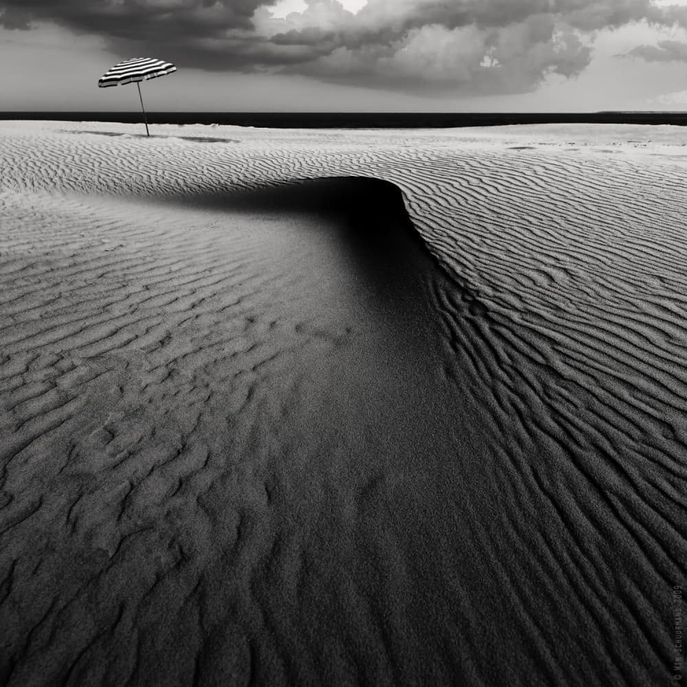 Solitary Beach Umbrella by Wim Schuurmans — canvas wall art