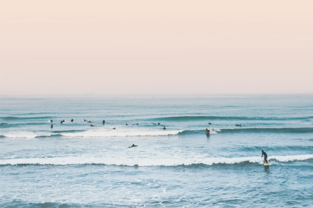 Surfers by Kathrin Pienaar — canvas wall art