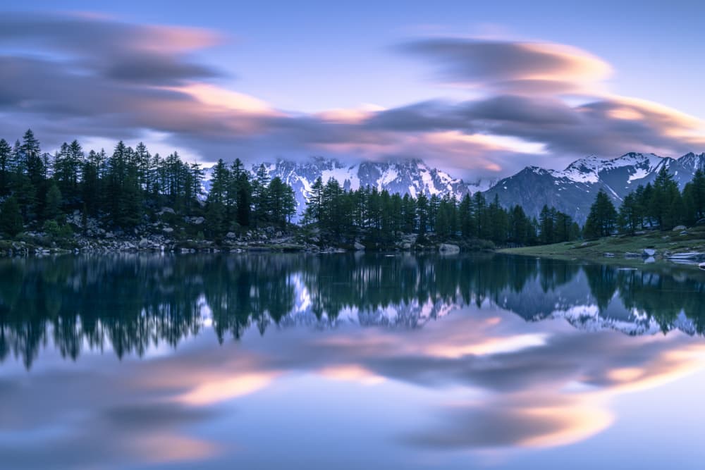 Serene Mountain Lake Reflection by Franco Ameli — canvas wall art