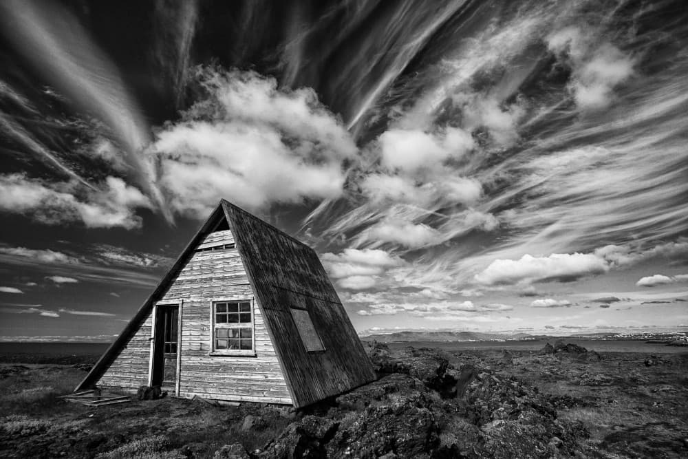 A-Frame Under Dramatic Sky by Þorsteinn H. Ingibergsson — canvas wall art