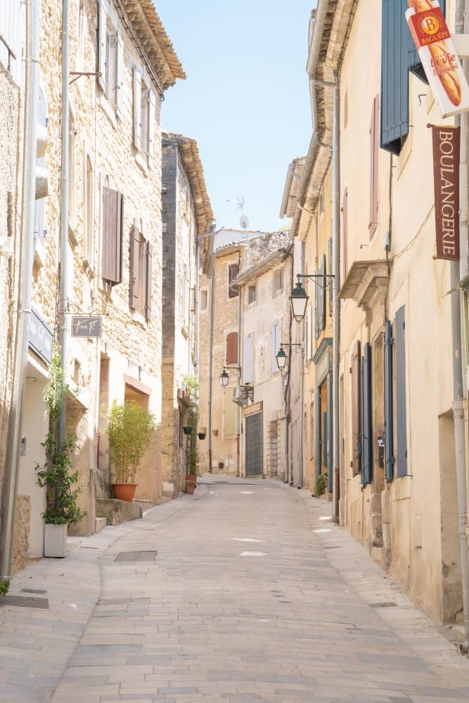 Provencal Village Street by Henrike Schenk — canvas wall art