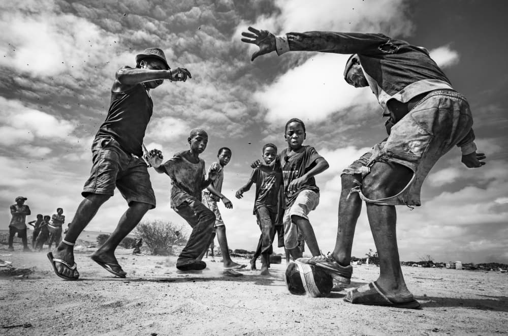 Boys Playing Street Soccer by João Coelho — canvas wall art