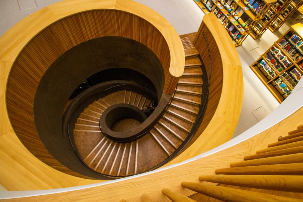 Golden Spiral Library Staircase by Anna Kogan — canvas wall art