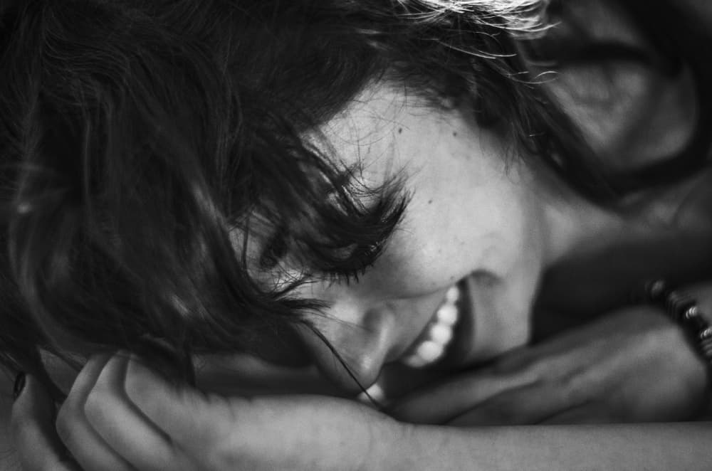 Joyful Woman Laughing by Davide Mennitto — canvas wall art