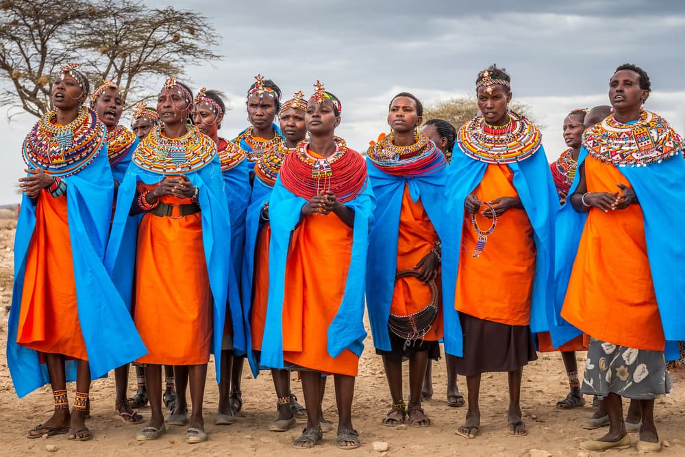 Maasai Women Colorful Robes by Jeffrey C. Sink — canvas wall art