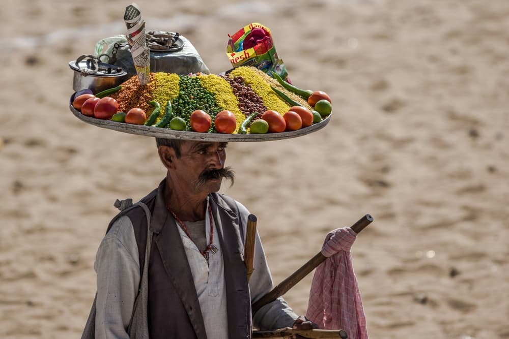 Indian Street Food Vendor by Pavol Stranak — canvas wall art