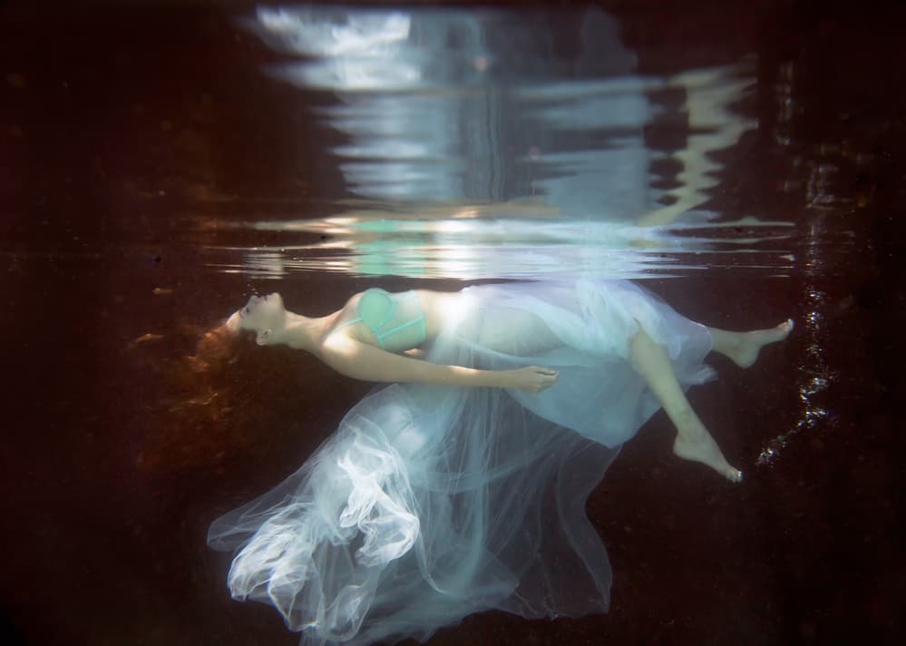 Serene Floating Woman by Gabriela Slegrova — canvas wall art