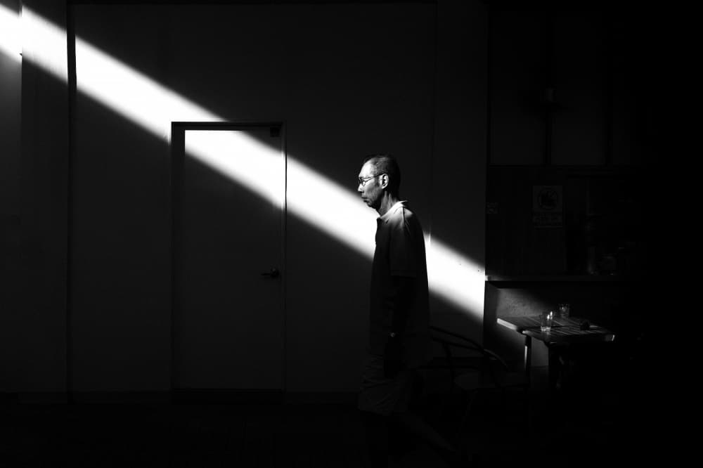 Man in Dramatic Light by Simon — canvas wall art
