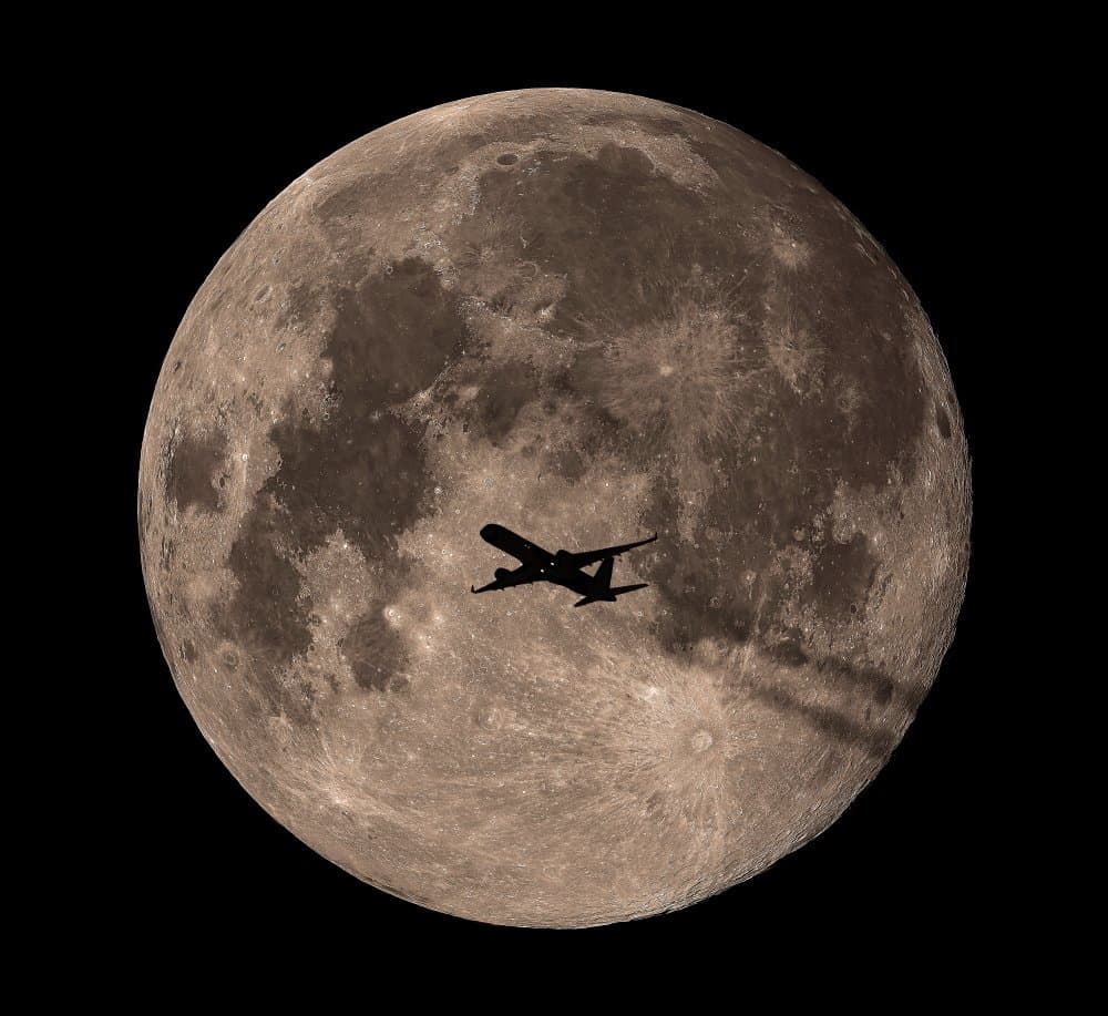 Dramatic Moon Flight by Mainak Chakraborty — canvas wall art