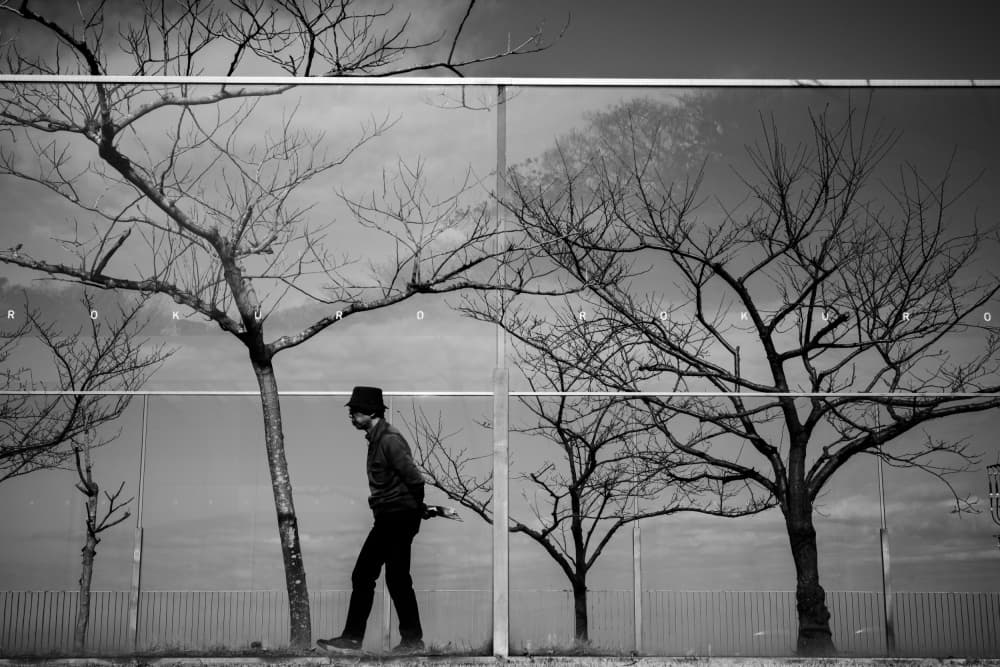 Solitary Urban Reflection by Satoshi Hata — canvas wall art