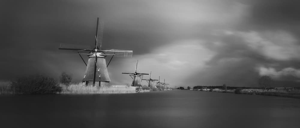 Serene Dutch Windmills by Saskia Dingemans — canvas wall art