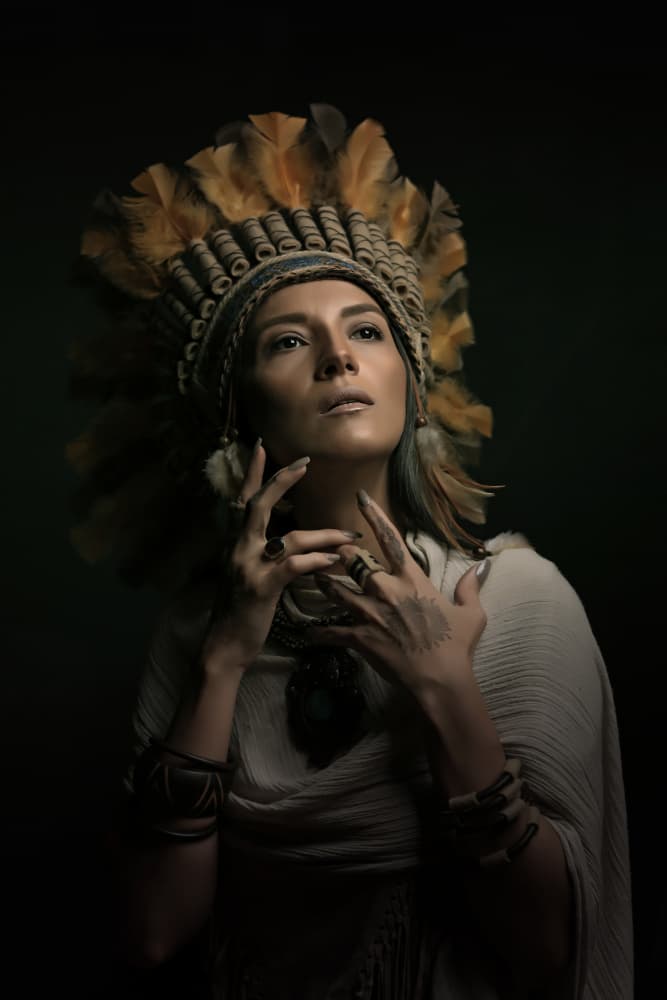 Indigenous Woman Feathered Headdress by Moein Hasheminasab — canvas wall art