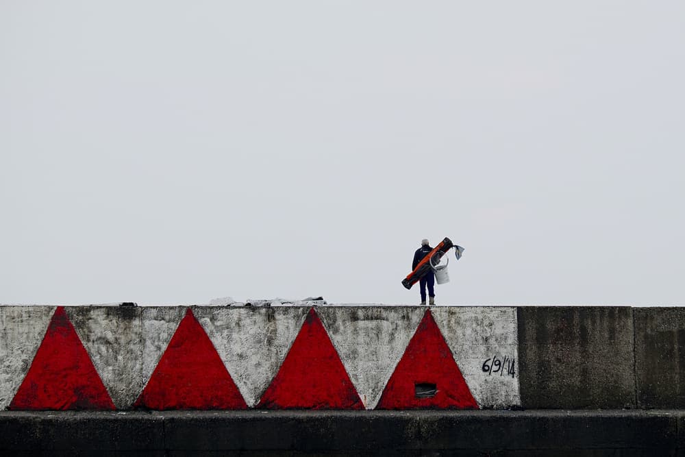 Red Triangles Fisherman by Roberto Parola — canvas wall art