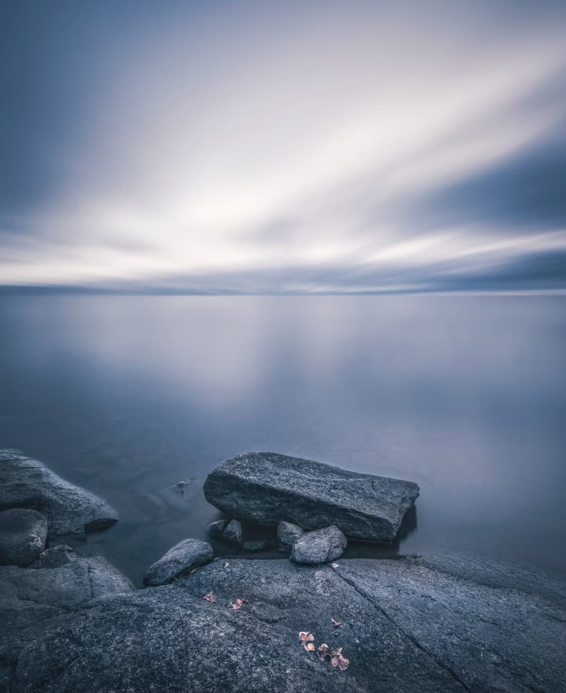 Tranquil Water and Rocks by Christian Lindsten — canvas wall art