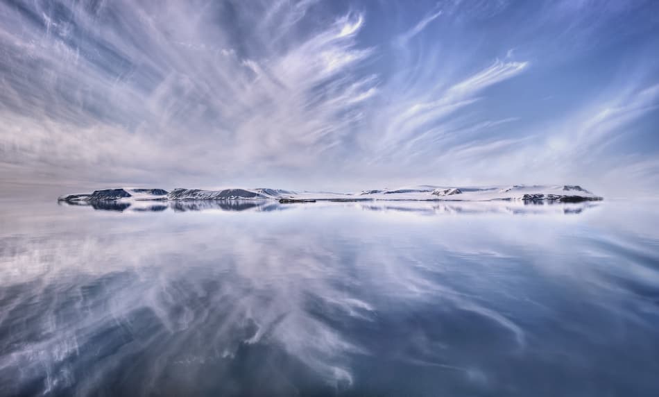 Serene Winter Reflection by Christian Schweiger — canvas wall art