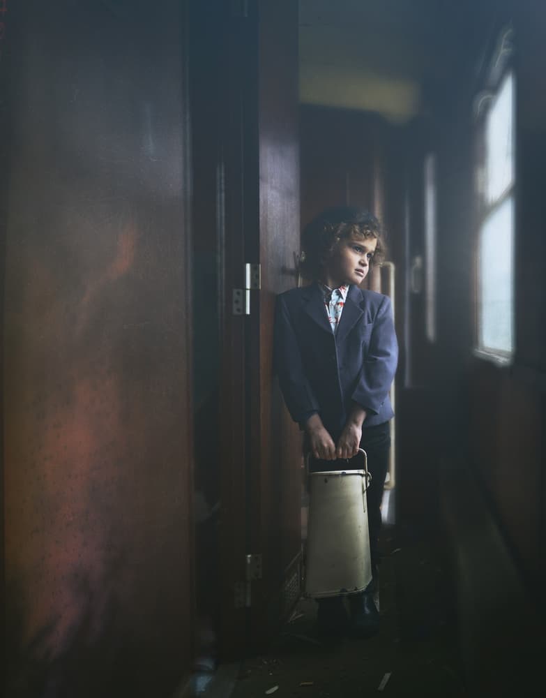 Boy With Vintage Carrier by Ewa Cwikla — canvas wall art