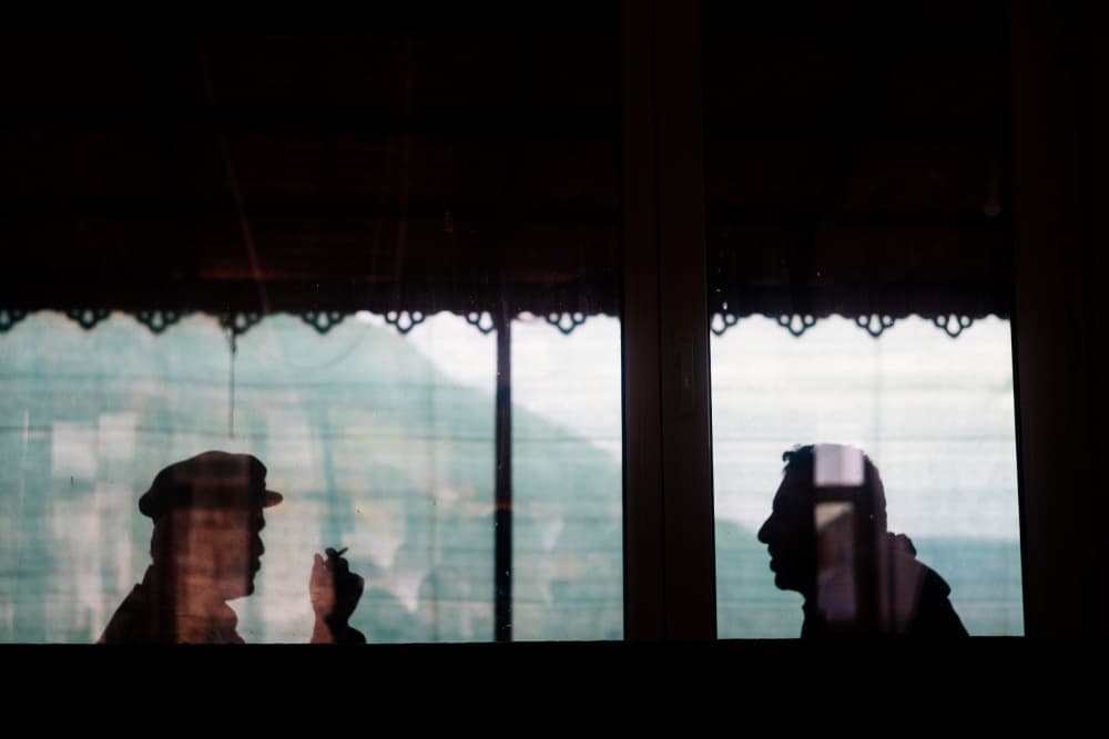Contemplative Window Silhouettes by M. Emre Erol — canvas wall art