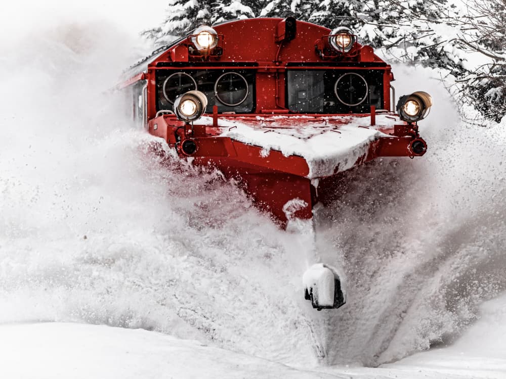 Red Snowplow Blasting Snow by YUTAKA KURAHASHI — canvas wall art