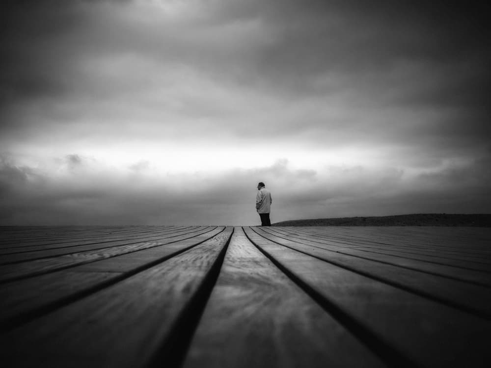 Solitary Figure Dark Sky by Christophe Staelens — canvas wall art
