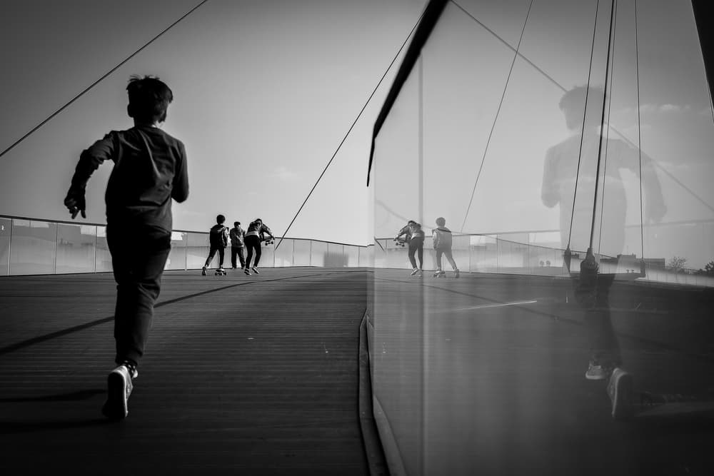 Urban Youth Running Reflection by Marius Surleac — canvas wall art
