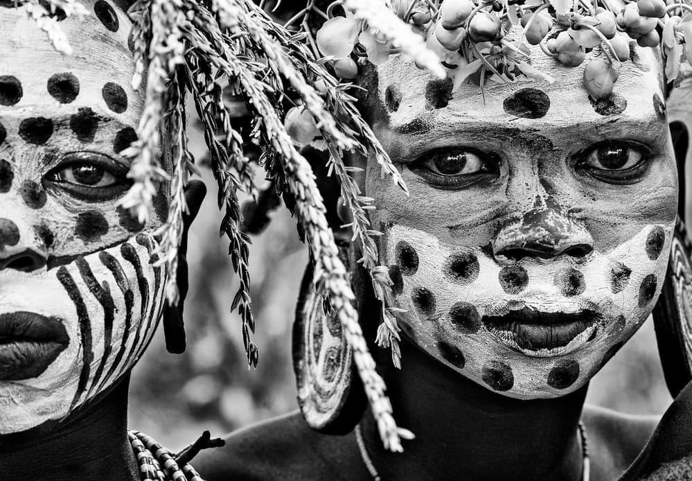 Painted Tribal Faces by Joxe Inazio Kuesta Garmendia — canvas wall art