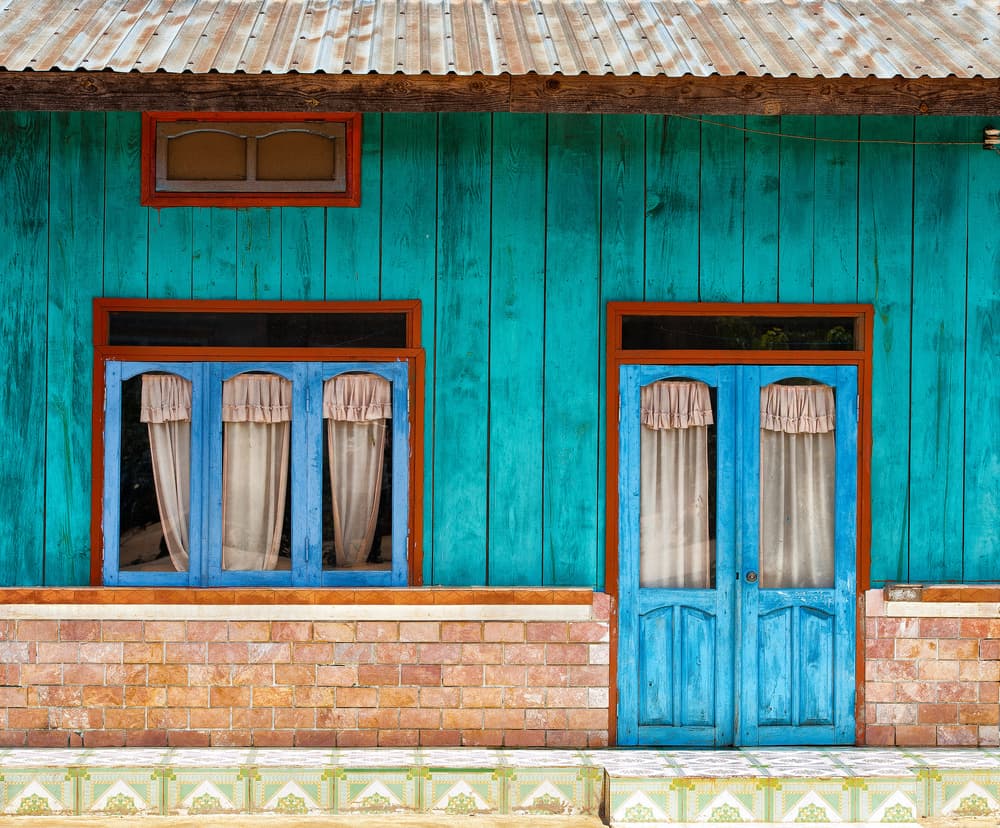 Colorful Blue Home by Wayne Pearson — canvas wall art