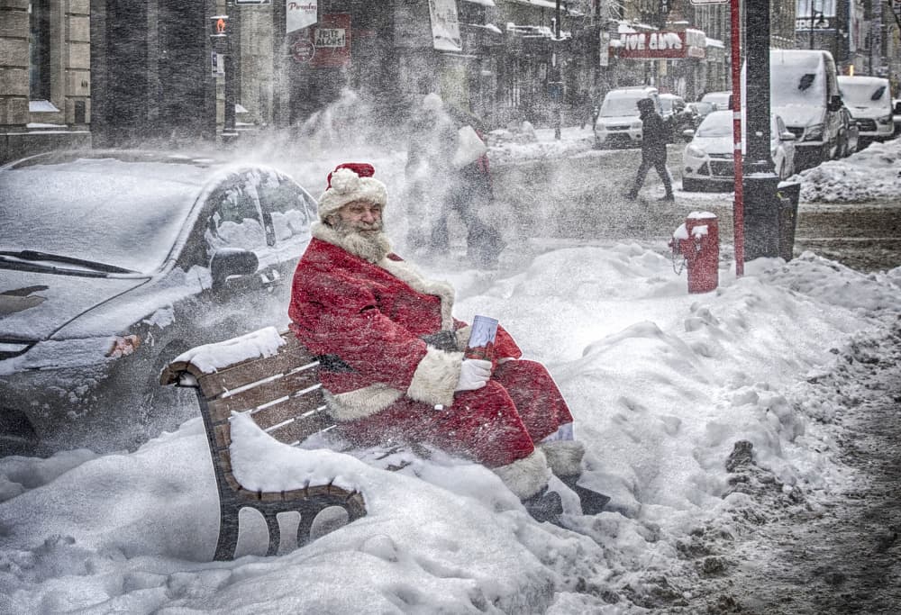 Santa's Snowy City Break by Angela Muliani Hartojo — canvas wall art