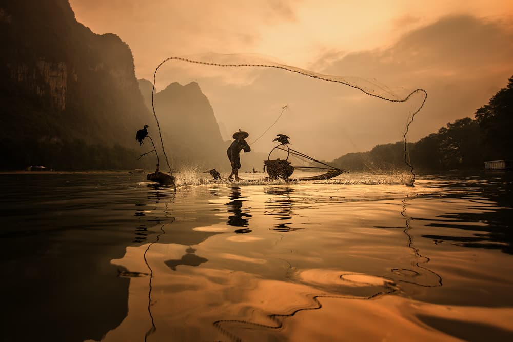 Golden River Fishing by Gunarto Song — canvas wall art