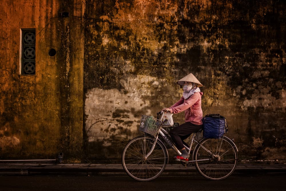 Hoian Street Cyclist by Pavol Stranak — canvas wall art