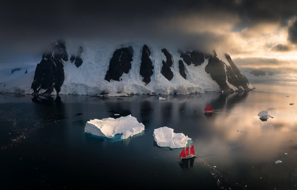 Red Sails Antarctic Journey by Karol Nienartowicz — canvas wall art