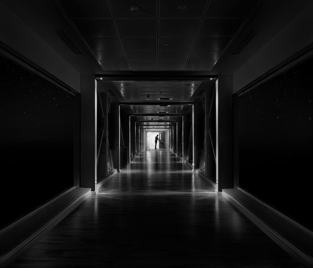 Solitary Figure Starlit Corridor by Nadav Jonas — canvas wall art
