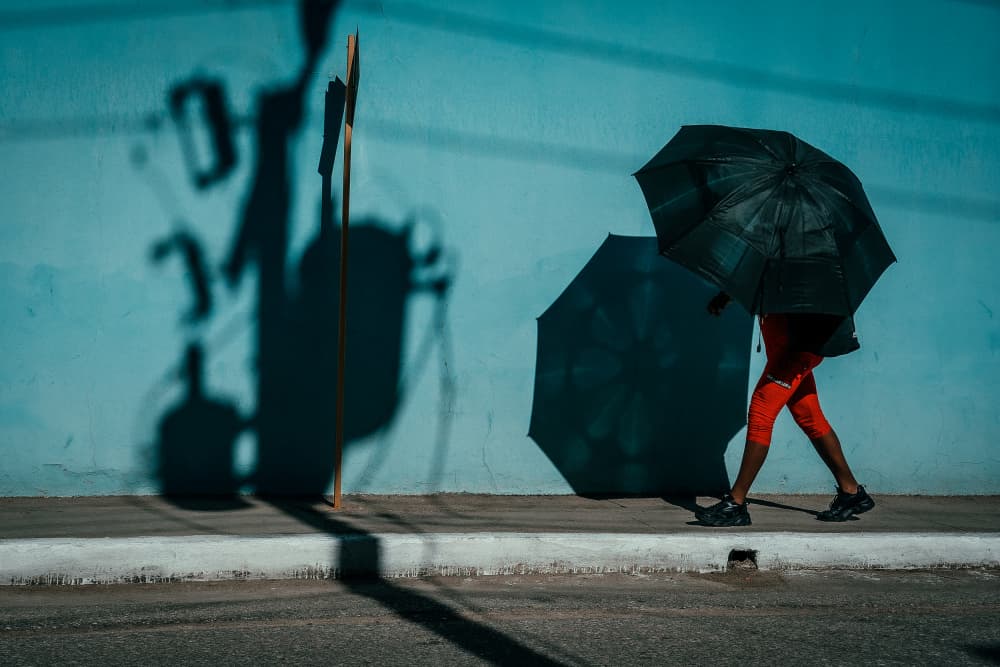 Umbrella Walker Shadows by Andy Bauer — canvas wall art