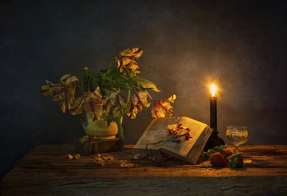 Candlelit Book And Flowers by Saskia Dingemans — canvas wall art