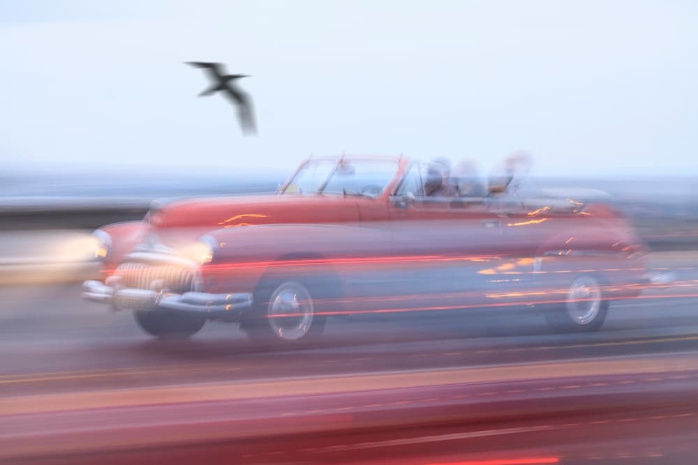 Speeding Red Convertible by Svetlin Yosifov — canvas wall art