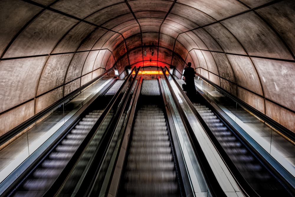Metro Escalator Red Light by Martin Steeb — canvas wall art