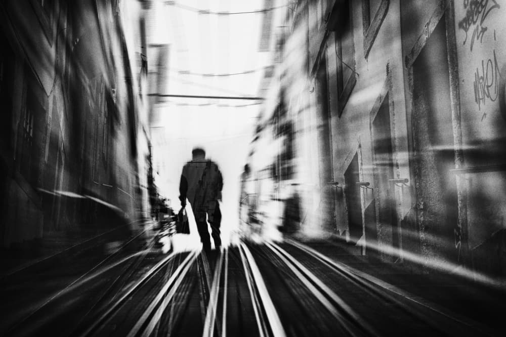 Lone Figure Urban Blur by Eric Drigny — canvas wall art