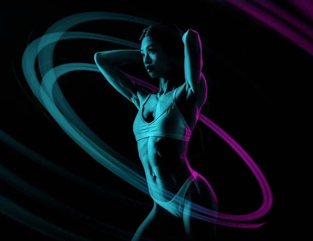 Athletic Woman Neon Glow by Frank Ma — canvas wall art