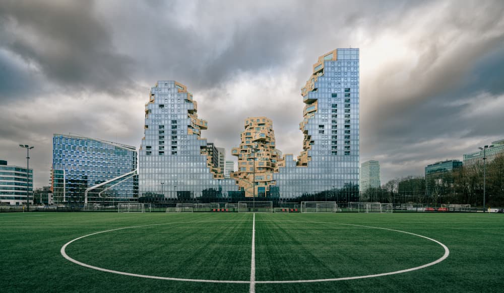 Soccer Field Cityscape by Michael Echteld — canvas wall art