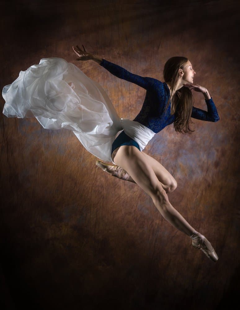 Ballerina In Flight by Oles Paritskiy — canvas wall art