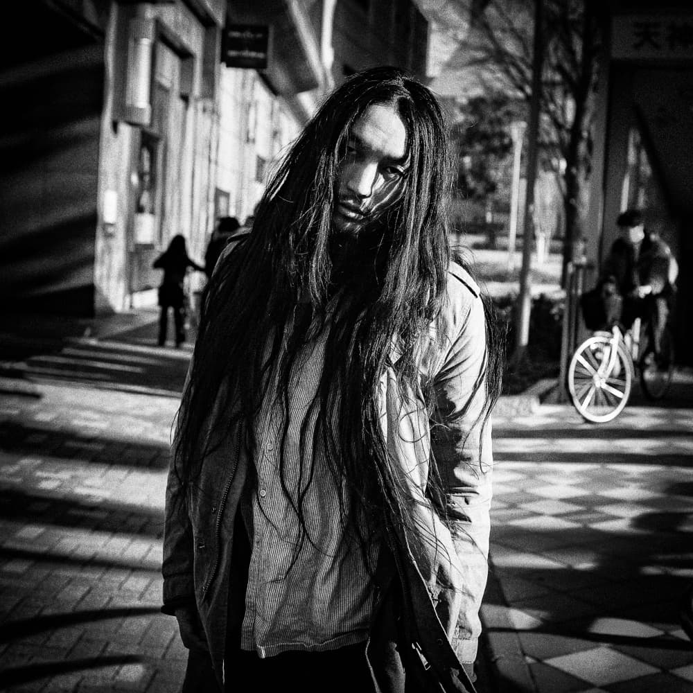 Pensive City Man by Shinji Isobe — canvas wall art