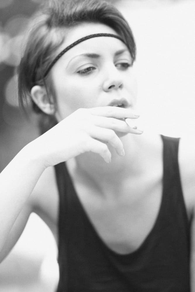 Pensive Woman Smoking by Tomas Härstedt — canvas wall art