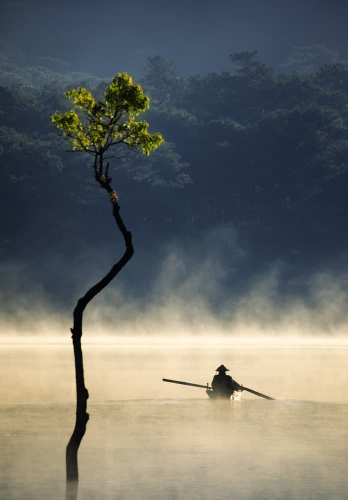 Rower On Misty Lake by Nguyen Tan Tuan — canvas wall art