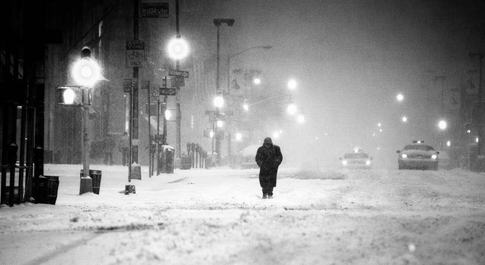Lone Figure in Snow Storm by Martin Froyda — canvas wall art