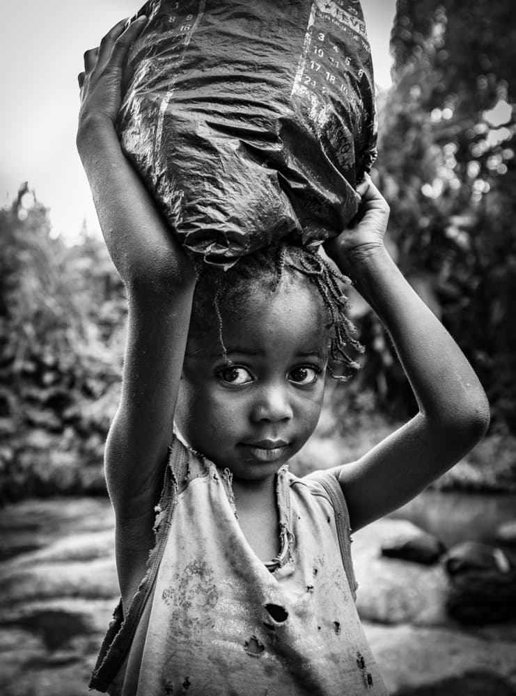 Child's Earnest Gaze by João Coelho — canvas wall art