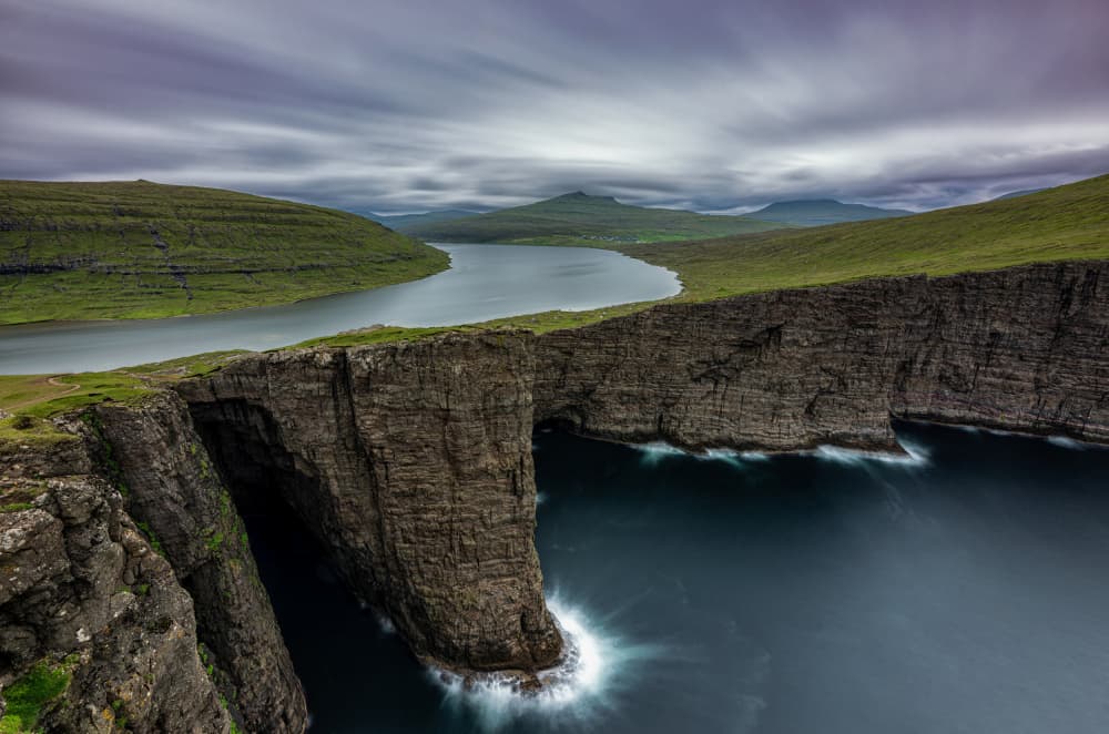 Faroe Islands Lake Over Ocean by James Zhen Yu — canvas wall art