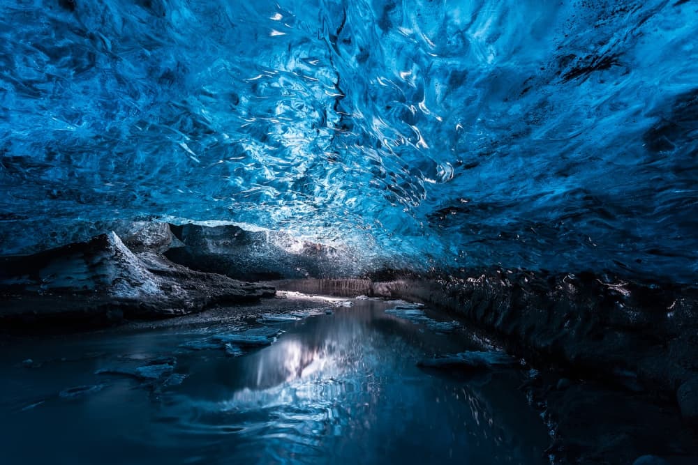 Blue Ice Cave River by Hervé Loire — canvas wall art